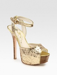Uplifted by a stacked heel and partially covered platform, this glitzy metallic leather go-to has an adjustable ankle strap and a peep toe. Stacked heel, 5½ (140mm)Covered platform, 2 (50mm)Compares to a 3½ heel (90mm)Metallic leather and glitter-coated leather upperLeather lining and solePadded insoleImportedOUR FIT MODEL RECOMMENDS ordering one half size up as this style runs small. 