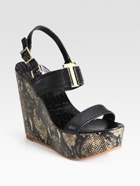 Pebbled leather straps with an adjustable slingback, connected with goldtone hardware and uplifted by a snake-print leather wedge. Snake-print leather wedge, 5 (125mm)Covered platform, 1½ (40mm)Compares to a 3½ heel (90mm)Pebbled leather upperLeather liningRubber soleImported