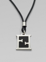 Leather cord necklace is accented by an iconic initial pendant of metal and leather.Metal/leatherAbout 1¼ x ½Necklace, about 23 longMade in Italy