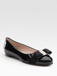Glossy patent leather classic is a favorite with signature grosgrain bow at the toe. Grosgrain bow and logo hardware at toe Leather lining and sole Made in ItalyOUR FIT MODEL RECOMMENDS ordering true size.