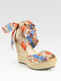 Leather and silk upper in a bold ikat print tops a textured espadrille wedge, finished with silk ties that form a bow at the ankle. Braided hemp wedge, 5 (125mm)Braided hemp platform, 1½ (40mm)Compares to a 3½ heel (90mm)Silk and leather upperLeather liningRubber solePadded insoleImported