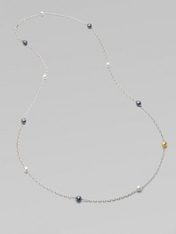 From the Caviar Collection. One extra long, ultra graceful chain of sterling silver, dotted with hammered beads of polished silver, blackened silver, and 24k yellow gold.Sterling silver and 24k yellow goldLength, about 50Spring clip claspImported