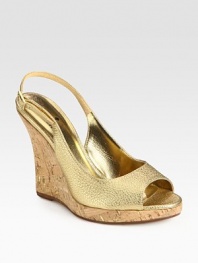 Soft metallic leather adds luster to a natural cork wedge. Cork wedge, 4 (100mm)Covered platform, ½ (15mm)Compares to a 3½ heel (90mm)Metallic leather upperLeather lining and solePadded insoleImportedOUR FIT MODEL RECOMMENDS ordering true size. 