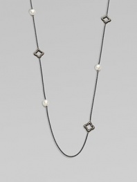 From the Midnight Pearl Collection. This lovely style features diamond accents, quatrefoils and lustrous pearl stations on a sleek, blackened sterling silver box chain. Blackened sterling silverWhite cultured South Sea pearlsDiamonds, .6 tcwLength, about 40Toggle closureImported 