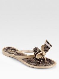 Lace print adorns this rubber slip-on for vintage appeal.Slip-on style Rubber straps and sole Made in ItalyOUR FIT MODEL RECOMMENDS ordering one half size down as this style runs large. 