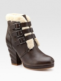 Soft leather look with a uniquely twisted heel, a trio of buckles and plush shearling trim. Self-covered heel, 4 (100mm) Covered platform, ½ (15mm) Compares to a 3½ heel (90mm) Leather and shearling upper Leather lining and sole Padded insole Imported