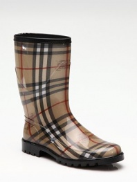Traditional signature check and prorsum horse-printed fabric are covered in clear rubber for waterproof protection.Rubber heel, 1 (25mm) Shaft, 9¼ Leg circumference, 14 Round toe Leather trim at top Pull-on style Padded insole Rubber lug sole Made in ItalyOUR FIT MODEL RECOMMENDS ordering true whole size; ½ sizes should order the next whole size down. 