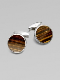 Rhodium-plated sterling silver links are set with a flush inlay of bamboo-patterned tiger's eye. Rhodium-plated sterling silver Tiger's eye About ½ diam. Made in the United Kingdom 