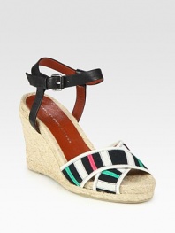 Multicolored grosgrain ribbon straps grounded by a classic espadrille wedge, finished with an adjustable leather ankle strap. Hemp wedge, 4 (100mm)Hemp platform, 1 (25mm)Compares to a 3 heel (75mm)Leather and grosgrain ribbon upperLeather lining and solePadded insoleImportedOUR FIT MODEL RECOMMENDS ordering one half size up as this style runs small. 