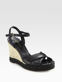 Natural espadrille wedge with an adjustable leather ankle strap and rubber sole for traction. Hemp-covered wedge, 3½ (90mm)Hemp-covered platform, 1 (25mm)Compares to a 2½ heel (65mm)Leather upperLeather liningRubber solePadded insoleImported
