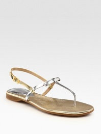Skinny metallic leather straps in a two-tone design, enhanced by a rubber sole and adjustable slingback. Metallic leather upperLeather liningRubber solePadded insoleMade in Italy