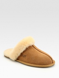 Shearling lining and trim create the ultimate in casual luxury. Round-toe design Leather sole Imported Fur origin: Australia
