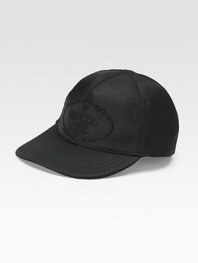 Sporty style in sleek nylon with tonal logo embroidery and wool lining. Stitched brim Made in Italy