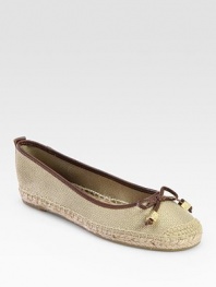 Timeless espadrille design in stretchy metallic canvas with smooth leather trim and dainty ties. Metallic canvas and leather upperHemp liningRubber soleImported