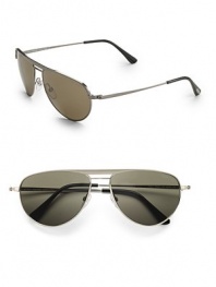 Sleek, lightweight metal frames are designed with double-bridge detail. Lens logo detail Made in Italy 