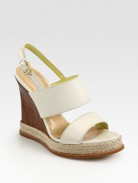 Backed by an adjustable slingback strap, this strappy leather essential has a wooden wedge and earthy espadrille trim. Wooden and braided hemp wedge, 4½ (140mm)Wooden and braided hemp platform, 1 (25mm)Compares to a 3½ heel (90mm)Leather upperLeather lining and solePadded insoleMade in ItalyOUR FIT MODEL RECOMMENDS ordering one size up as this style runs small. 