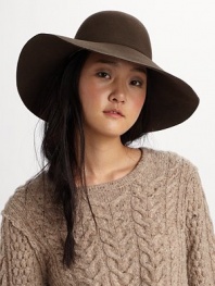 Make a striking silhouette in this wide-brimmed wool design.Wool Spot clean Made in USA