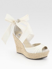 Soft suede straps top an espadrille wedge and platform, finishing with silk ties that form a bow at the ankle. Braided hemp wedge, 5 (125mm)Braided hemp platform, 1½ (40mm)Compares to a 3½ heel (90mm)Silk and suede upperLeather liningRubber solePadded insoleImported