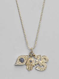 Three traditional protective amulets - the hamsa, the evil eye and the sacred om - dazzle in pavé diamonds with sapphire accents as they dangle from a 14k yellow gold ball chain. Diamonds, 0.38 tcw Blue sapphires 14k yellow gold Chain length, about 16 Pendants, about ¾L X ¾W each Lobster clasp Imported
