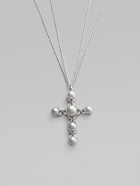 A classic symbol of faith, rendered in lustrous organic pearls with sparkling accents. 12mm white round man-made pearls Cubic zirconia Rhodium-plated sterling silver Chain length, about 17 Pendant, about 2½L x 1½W Spring ring clasp Imported