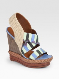 Lovely printed canvas design with an espadrille-inspired slingback, stacked wedge and braided leather trim. Stacked wedge with braided leather trim, 5 (125mm)Stacked platform with braided leather trim, 1½ (40mm)Compares to a 3½ heel (90mm)Hemp, canvas and leather upperLeather lining and solePadded insoleImported