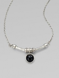 A single, glossy dome of black agate on a curved bar and a link chain. SilvertoneBlack agateLength, about 18Pendant size, about ½Lobster clasp closureMade in USA