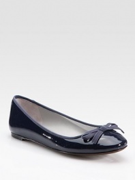 Patent leather staple with grosgrain trim and a delicate bow. Patent leather upperLeather lining and solePadded insoleImported