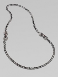 From the Jewels Verne Collection. A bold woven chain of sterling silver with a black rhodium finish has pretty filigree links with red garnet and goldplated accents.Red garnetBlack rhodium-plated sterling silver and rose goldplated sterling silverLength, about 26Imported