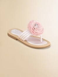 Not for the beach, these party flip flops are graced with soft tulle rosettes for a fun, festive look.Terylene satin upperThong front with multi straps across the middleComposite rubber solePadded insoleFaux leather liningImported