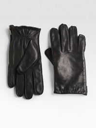 Classic winter essential in finely crafted in leather with side zip detail.Side zipLeatherDry cleanImported