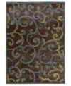 Retreat to a comfortable new space. This distinctive rug offers a slightly worn look, graced with a beautiful vinery pattern in varying shades of blue, beige and black. Created from a durable blend of polypropylene and acrylic, the Expressions rug is designed to retain both its color and its luxuriously dense weave for years to come.