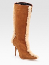 Buttery suede style with front-to-back shearling trim for a luxuriously plush look. Self-covered heel, 3 (75mm) Shaft, 13 Leg circumference, 15 Suede upper Shearling trim Leather lining Buffed leather sole Padded insole Made in ItalyOUR FIT MODEL RECOMMENDS ordering one half size up as this style runs small. 
