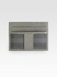 A translucent ID window on one side and iconic checks on the other: this slim and singular case is a traveler's dream.ID windowTwo card slotsPVC/Leather4½ x 3Made in Italy