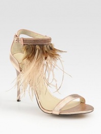 Shimmering metallic leather straps embellished by an array of exotic feathers. Self-covered heel, 4 (100mm)Metallic leather and feather upperAdjustable ankle strapLeather lining and solePadded insoleMade in ItalyOUR FIT MODEL RECOMMENDS ordering true size. 