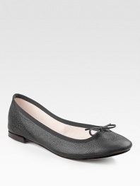 A true ballet style in textured leather with grosgrain trim and classic bow tie. Stacked heel, ½ (15mm) Slight point toe Tie detail Leather sole Made in FranceOUR FIT MODEL RECOMMENDS ordering one half size down as this style runs large. 