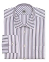 Stripes line up for streamlined boardroom style on this essential Ike Behar dress shirt.