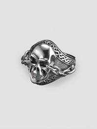 Uniquely engraved sterling silver with a detailed skull motif. About 1 X 1 Made in USA