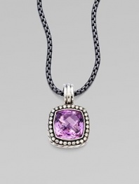 From the Moonlight Ice Collection. A beautiful amethyst stone surrounded by pavé diamonds. Amethyst Diamonds, 0.45 tcw Blackened sterling silver Size, about ½L X ½ W Imported Please note: Chain sold separately. 