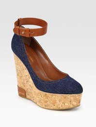 Comfortable cork wedge with a stretch denim upper and an adjustable leather ankle strap. Cork and leather wedge, 5 (125mm)Cork platform, 2 (50mm)Compares to a 3 heel (75mm)Denim and leather upperLeather liningRubber solePadded insoleMade in Spain