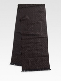 The signature gancini design adds a luxurious trademark to this fine wool scarf. 74 X 14 Wool Dry clean Made in Italy 
