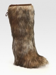 Faux fur essential with a hidden wedge and an adjustable toggle top.Hidden wedge, 3½ (90mm) Shaft, 15 Leg circumference, 15 Faux fur upper Nylon lining Rubber lug sole Padded insole Imported Please note: Colors may vary.OUR FIT MODEL RECOMMENDS ordering one half size up as this style runs small. 