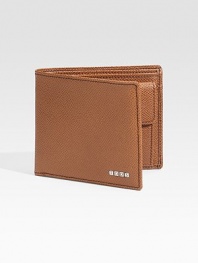 EXCLUSIVELY AT SAKS. A timeless leather classic, elegantly appointed in lightly textured leather with metal logo accents. One bill compartment Coin pocket Four card slots 4 X 3½ Made in Italy 