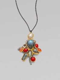 A colorful cluster of semi-precious stones with goldtone and Swarovski crystal accents on a gunmetal finished link chain. May include labradorite, carnelian and smokey quartzMay included mother-of-pearl doublet, imitation coral and Swarovski crystalsGoldtoneRuthenium platedLength, about 32Lobster clasp closurePendant size, about 2¾ Made in USAPlease note: Stones may vary. 