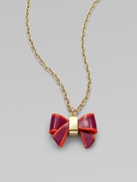 A sweet colorblocked bow on a long goldtone link chain. Acetate10K goldplated brassLength, about 15½Pendant size, about 1 Spring ring closureImported 