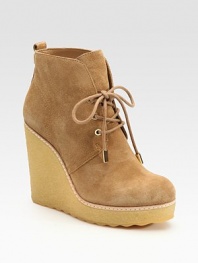 Urban-chic suede look with a crepe wedge and lovely lace-up front. Crepe wedge, 4¼ (110mm) Covered platform, 1 (25mm) Compares to a 3¼ heel (80mm) Suede upper Leather lining Crepe sole Padded insole ImportedOUR FIT MODEL RECOMMENDS ordering true size. 