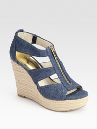 Comfy denim classic with an espadrille wedge and exposed front zipper. Hemp wedge, 4 (100mm)Hemp platform, 1 (25mm)Compares to a 3 heel (75mm)Denim upperLeather liningRubber solePadded insoleImported