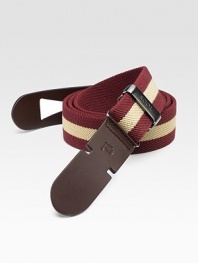 EXCLUSIVELY AT SAKS. A new casual classic, designed in a substantial cotton weave with a leather slide-through buckle Leather buckle About 1½ wide Made in Italy 
