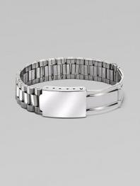 This bold bracelet borrows the style of a man's flexible watchband, cleverly creating a flexible link design, without the watch, of course.Silvertone Diameter, about 2½ Width, about 1 Foldover deployant clasp Made in Italy