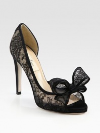 Intricately crafted, semi-sheer lace silhouette with a skinny heel, peep toe and divine bow adornment. Self-covered heel, 4 (100mm)Semi-sheer lace upperLeather lining and solePadded insoleMade in Italy