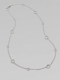 A long design punctuated with multiple sized circle links. Sterling silver Length, about 36 Lobster clasp closure Imported 